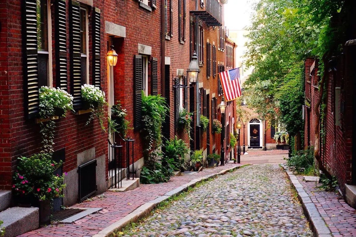 Historic brownstone houses on Acorn Street in Beacon Hill, Boston
